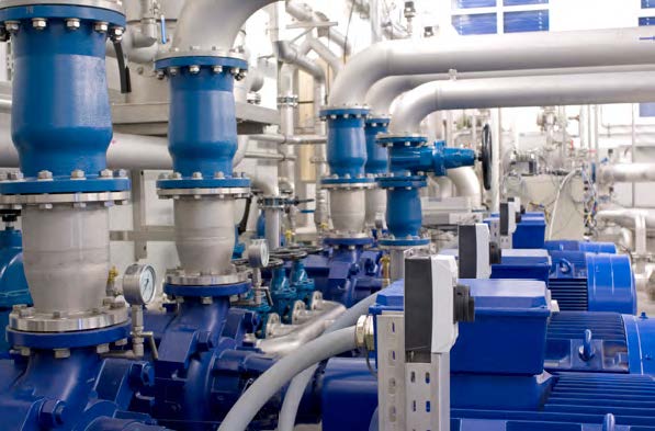 A picture of pumps in a factory.
